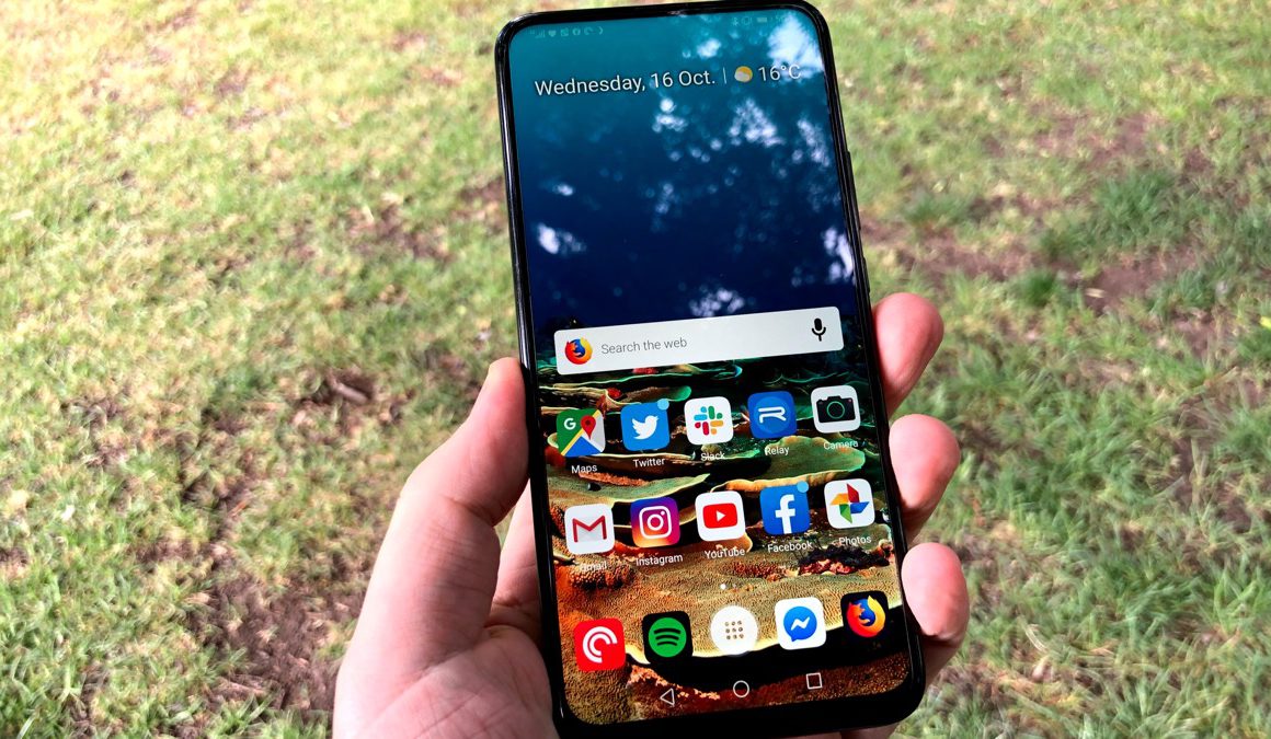 Hand holding Huawei Y9 Prime smartphone