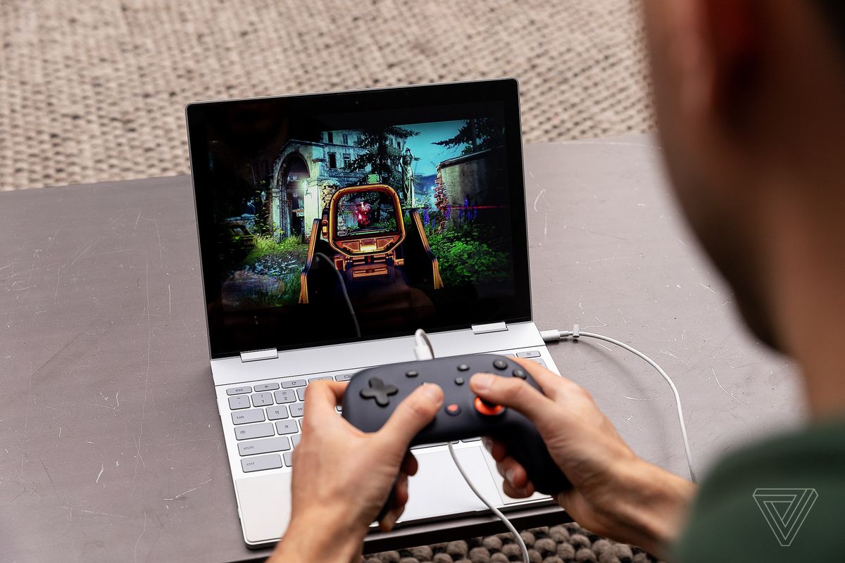 Google Stadia controller and laptop